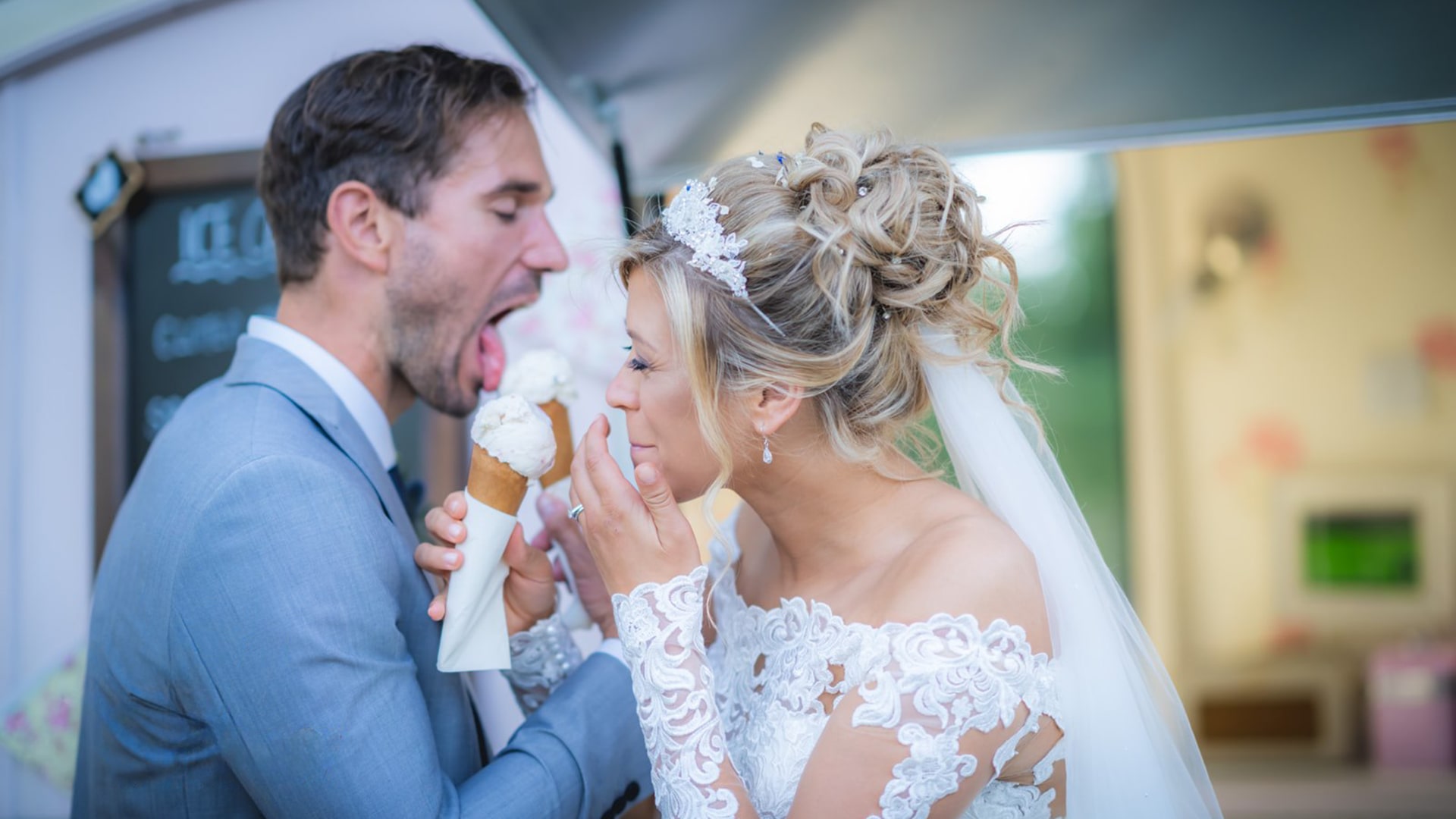 wedding couple eating ice creams by a van, laughing at Tournerbury Woods Estate wedding venue