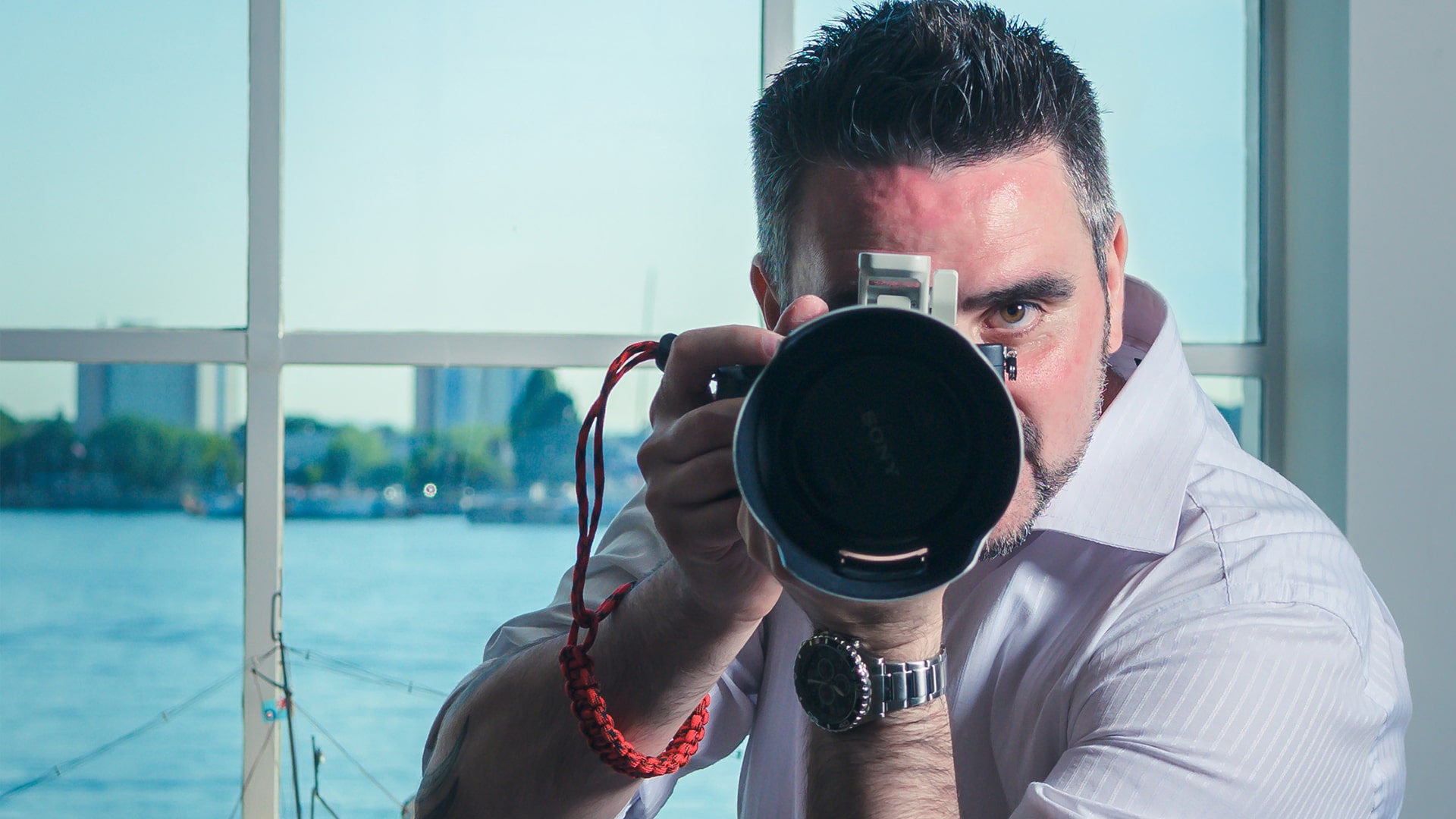 andy hornby with his camera pointing at the camera